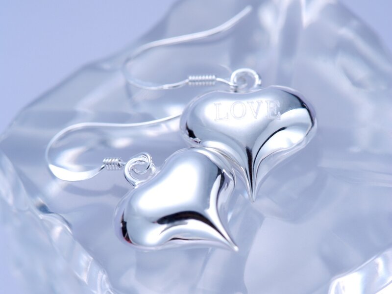 Silver heart earrings with 'LOVE' engraving