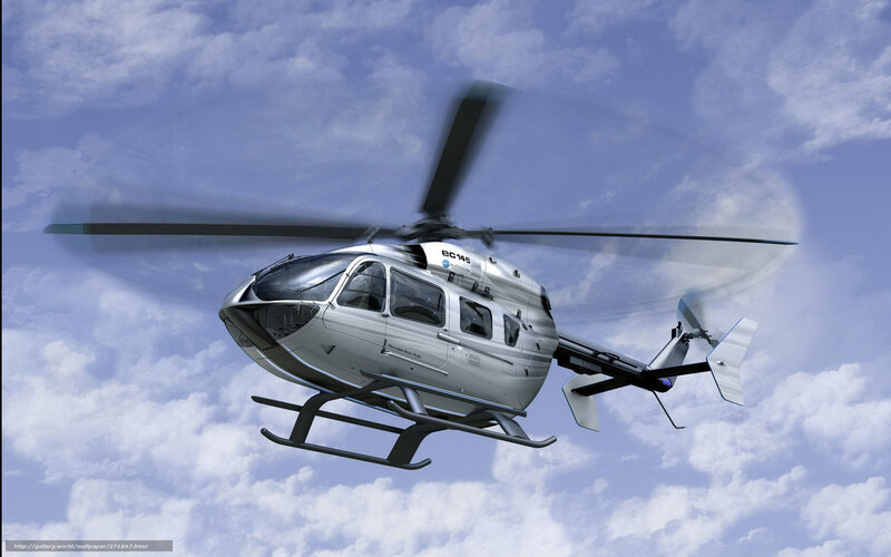 Silver Helicopter in Flight — Dynamic, Afternoon