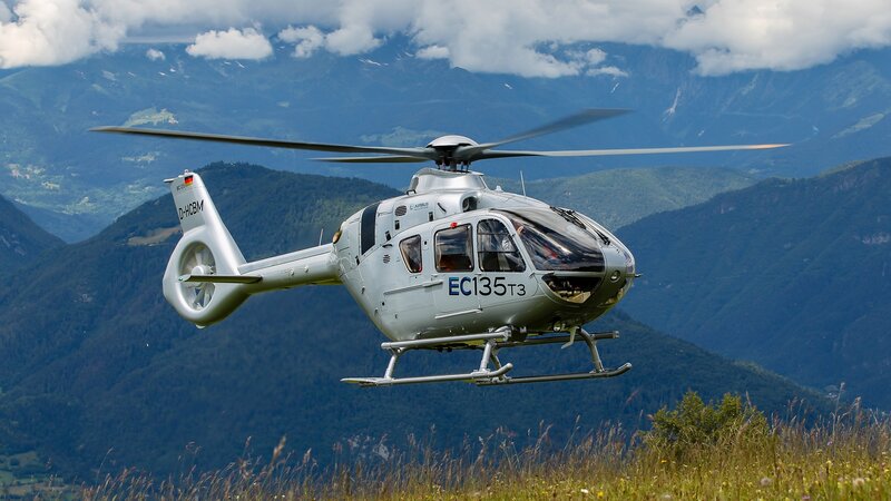 Silver Helicopter in Flight — Gray, Dramatic