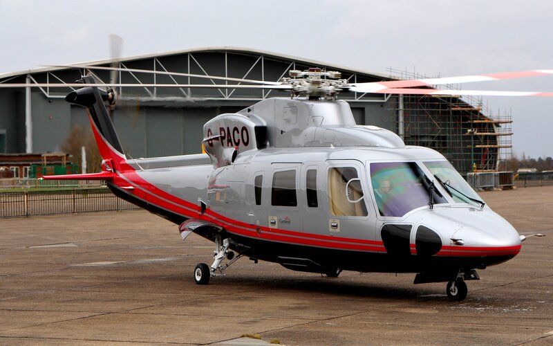 Silver Helicopter on Tarmac — Gray