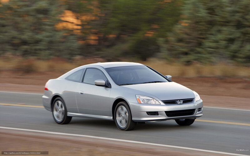 Silver Honda Accord Coupe in motion