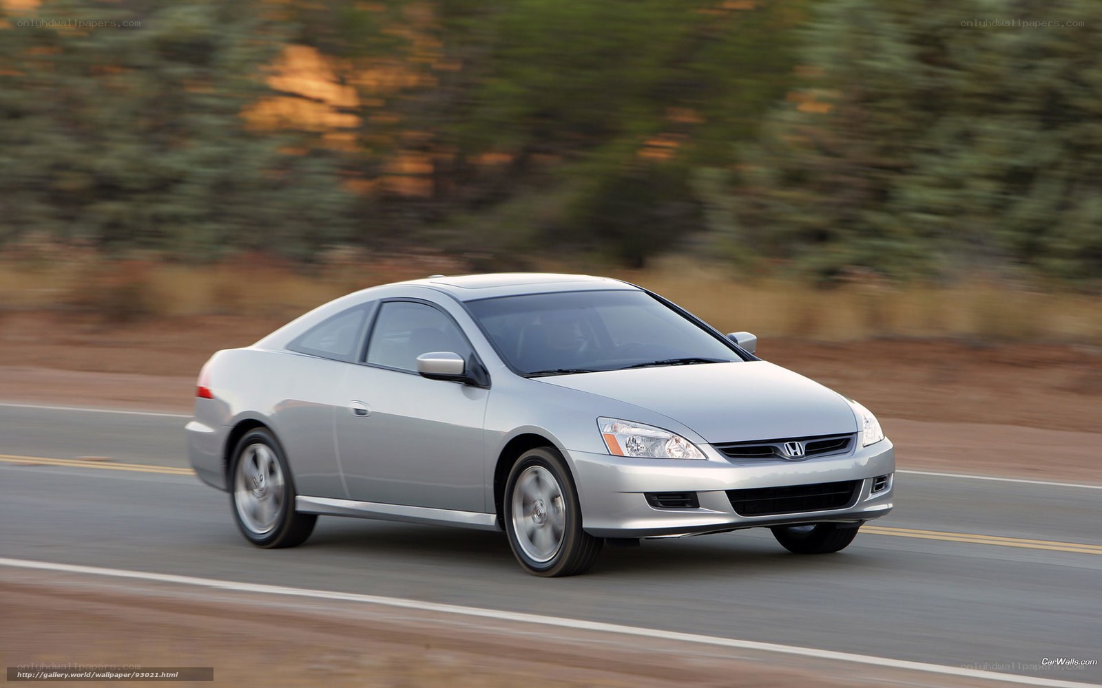 Silver Honda Accord Coupe in motion