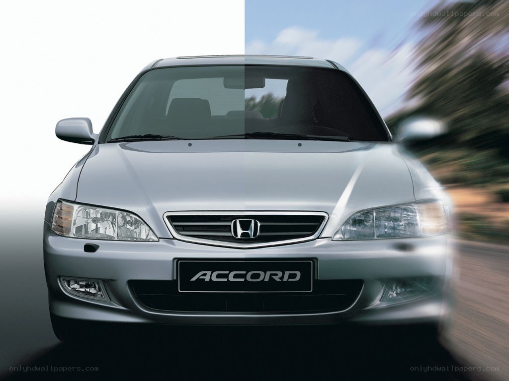 Silver Honda Accord front view