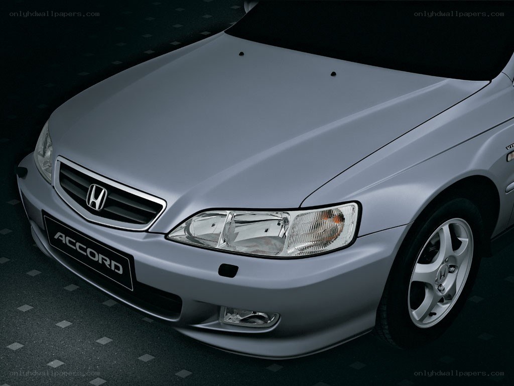 Silver Honda Accord front view