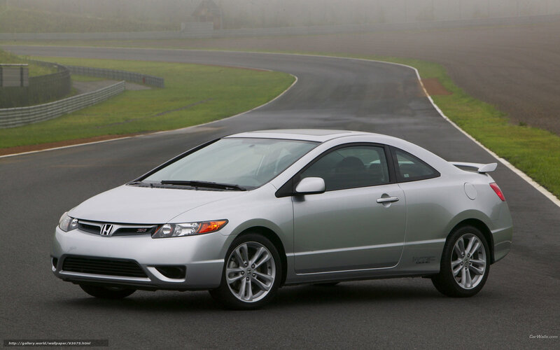 Silver Honda Civic on a racetrack
