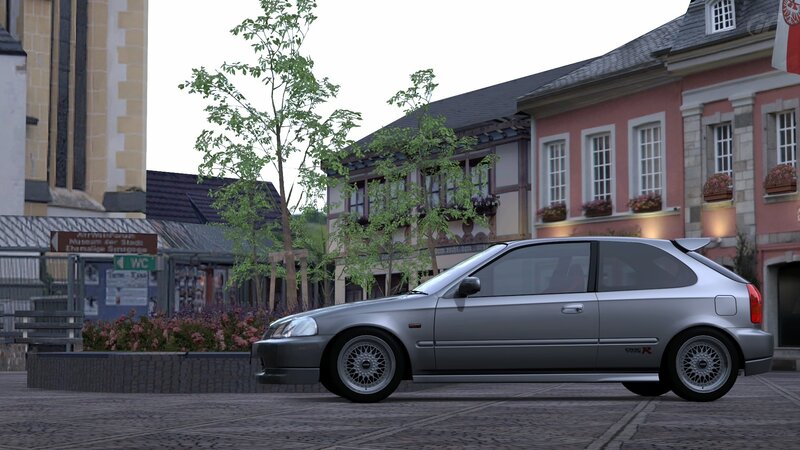 Silver Honda Civic R in town
