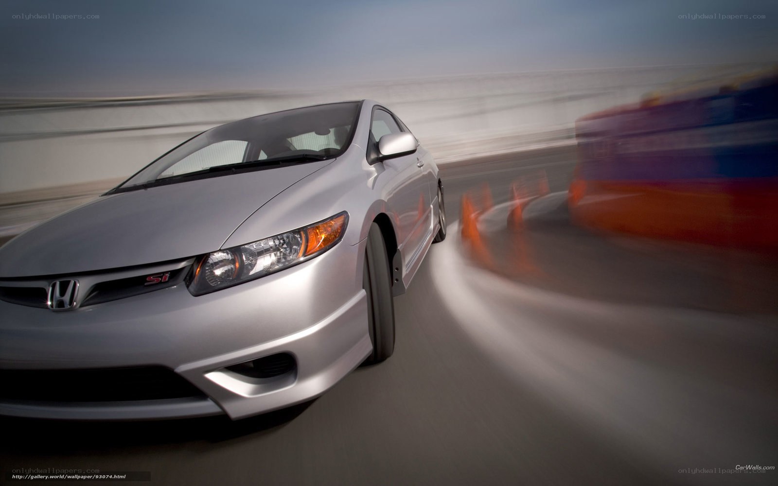 Silver Honda Civic Si in motion