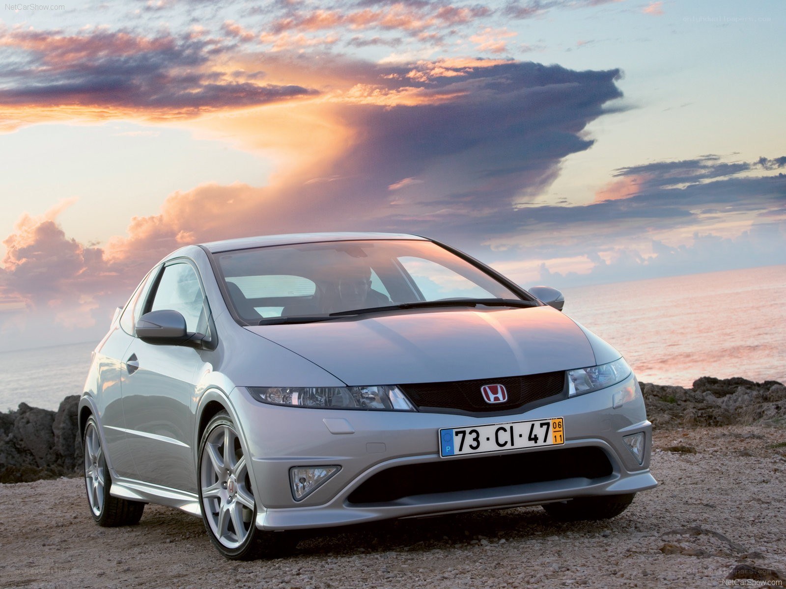 Silver Honda Civic Type R at sunset