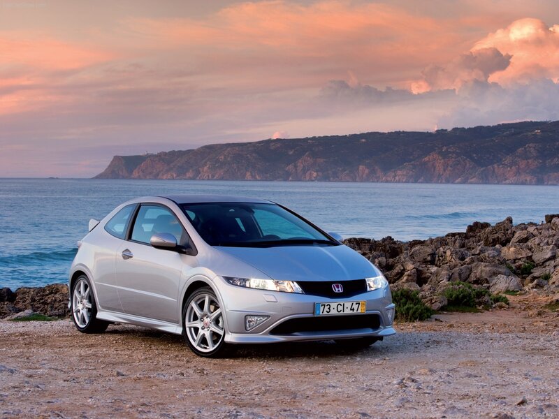 Silver Honda Civic Type R by the sea