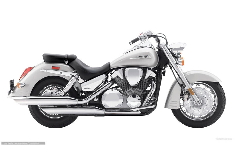silver honda cruiser motorcycle