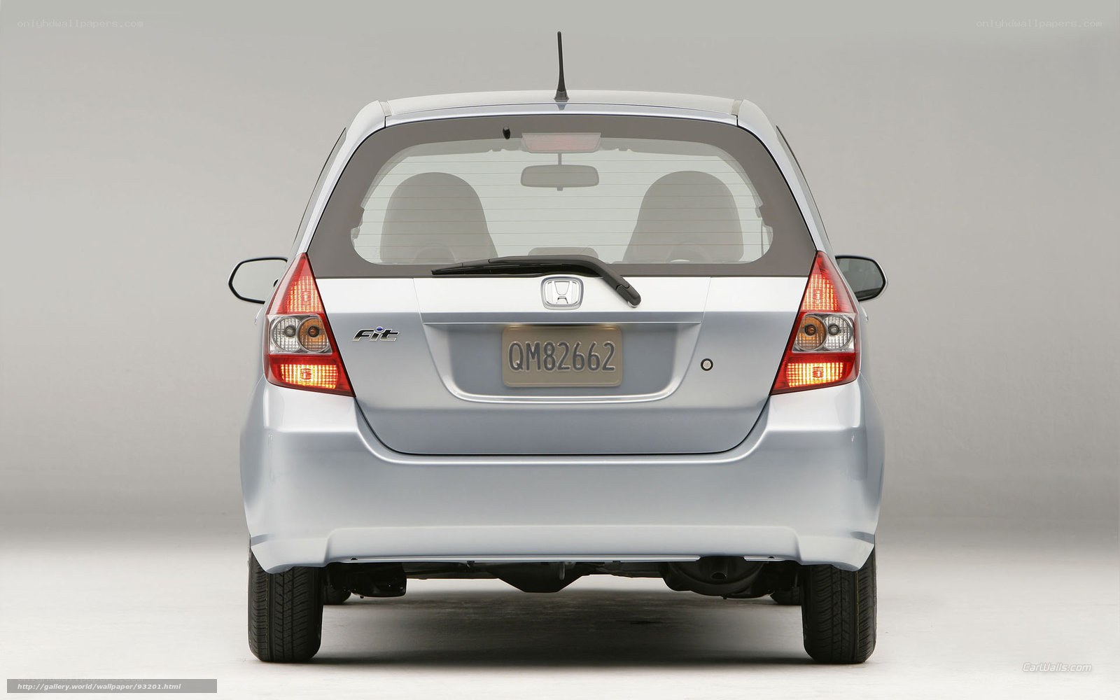 silver honda fit rear view