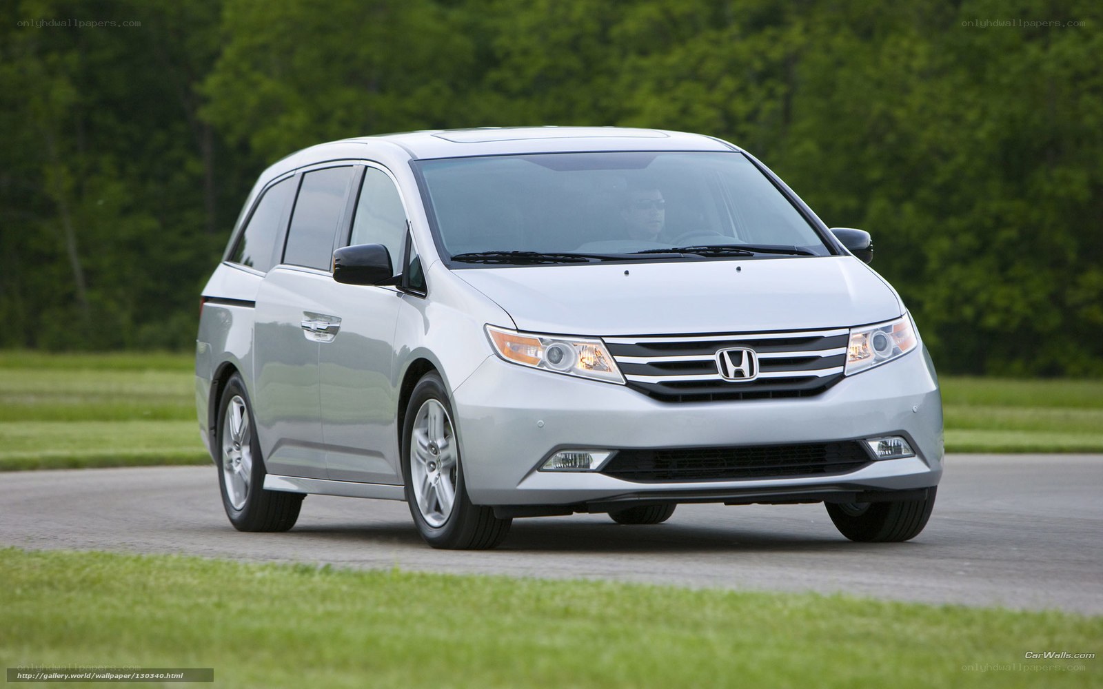 silver Honda minivan on road