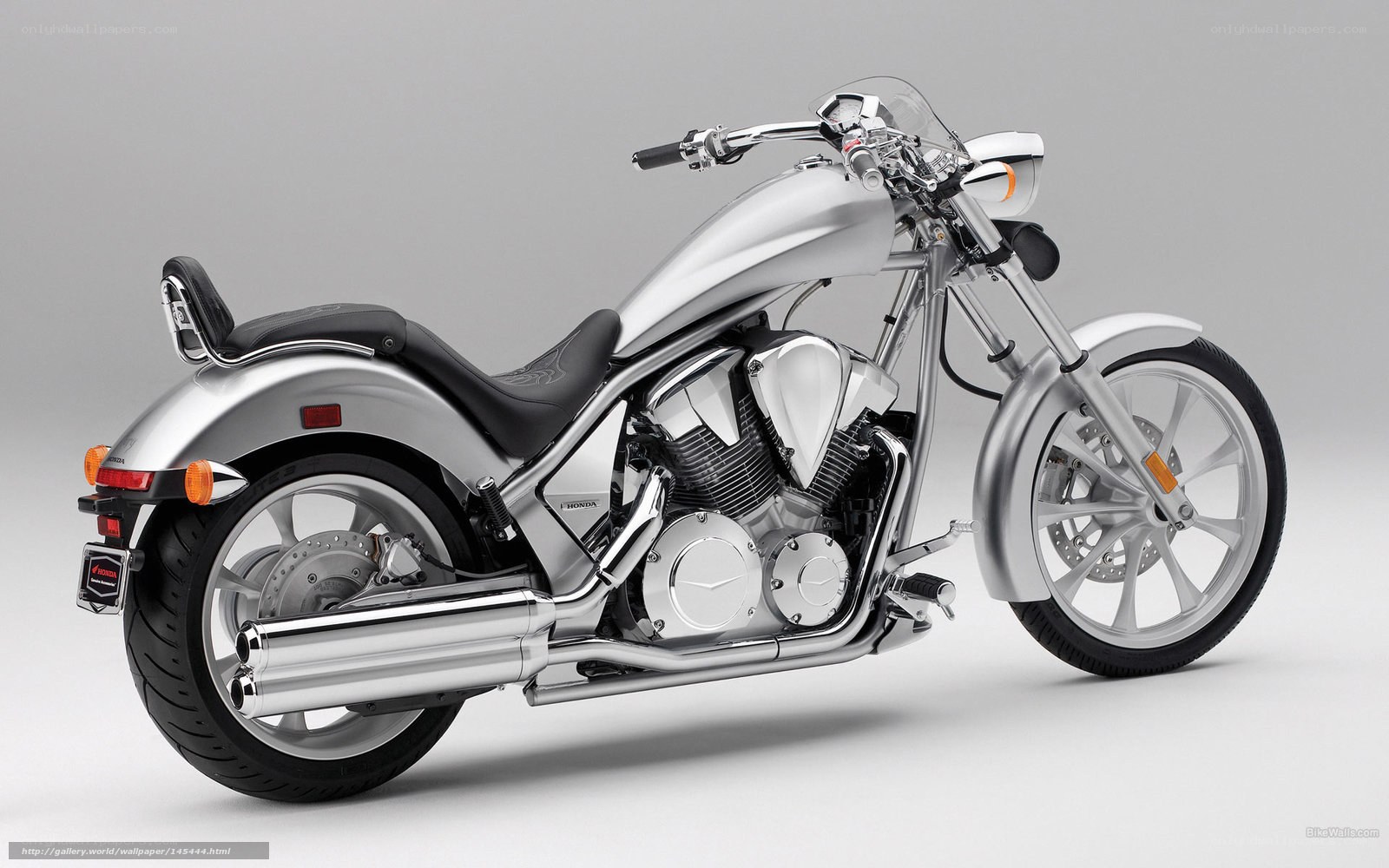 Silver Honda motorcycle