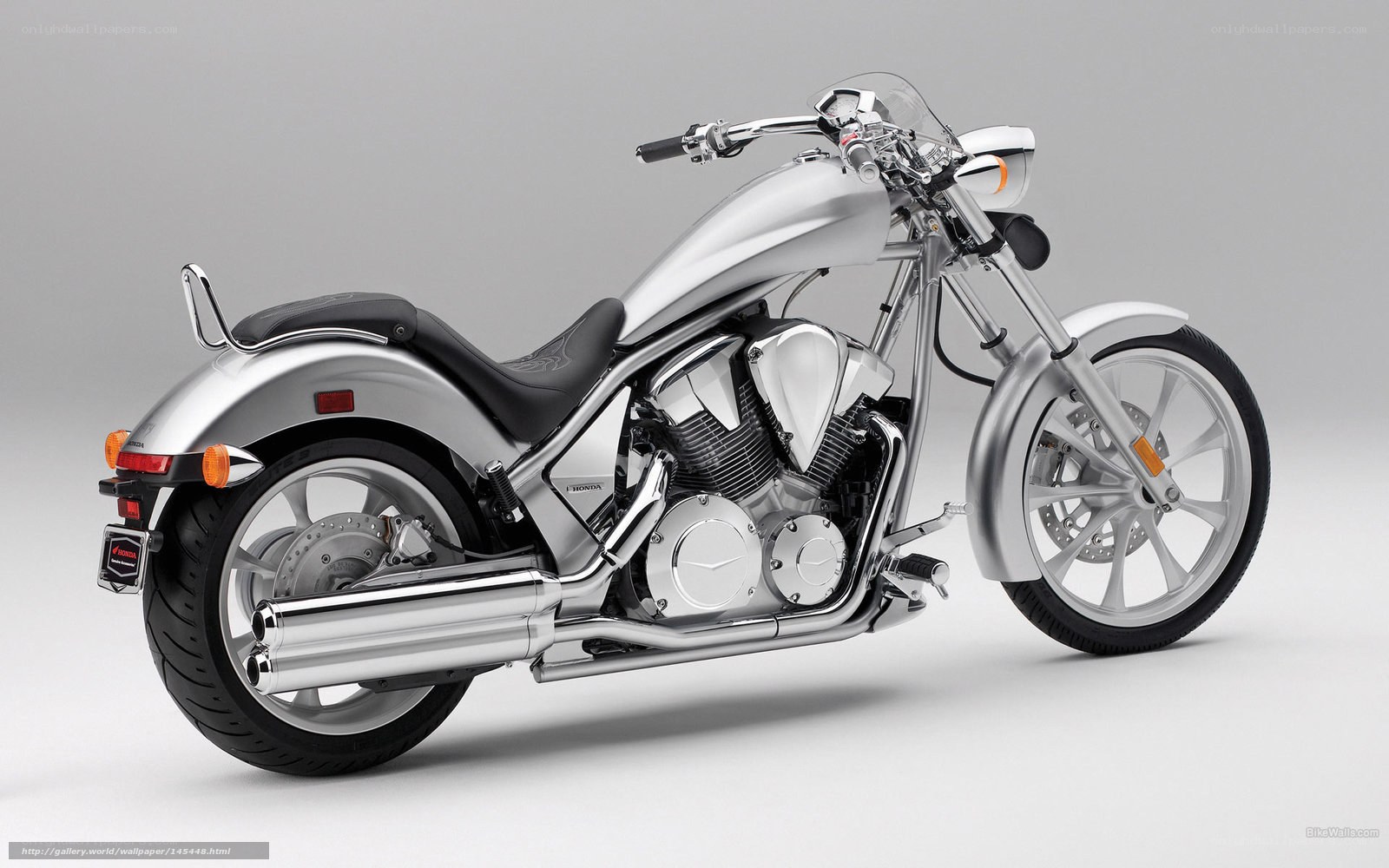 Silver Honda motorcycle