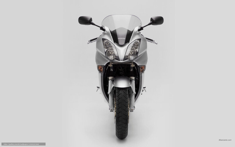 silver honda motorcycle front view