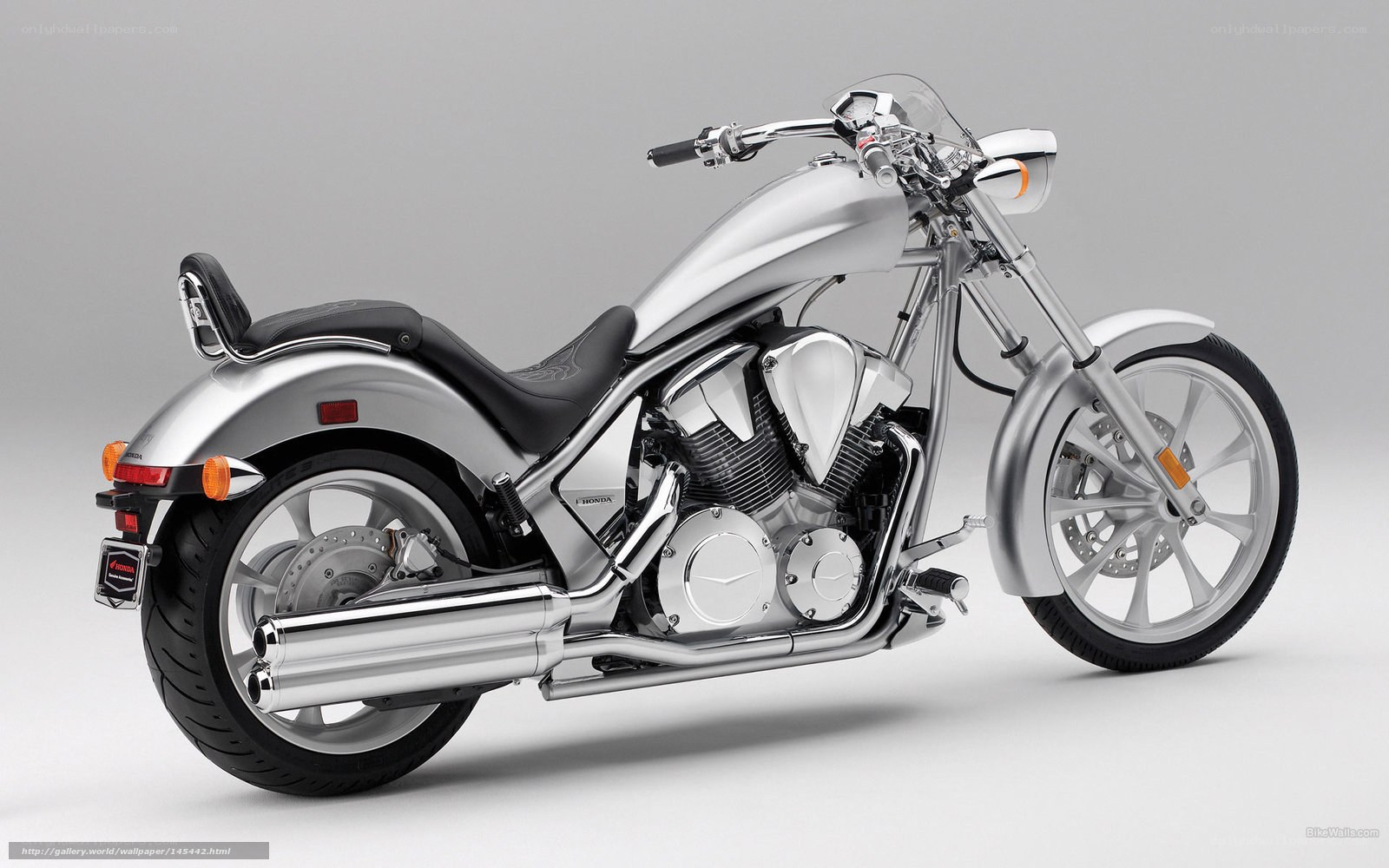 Silver Honda motorcycle