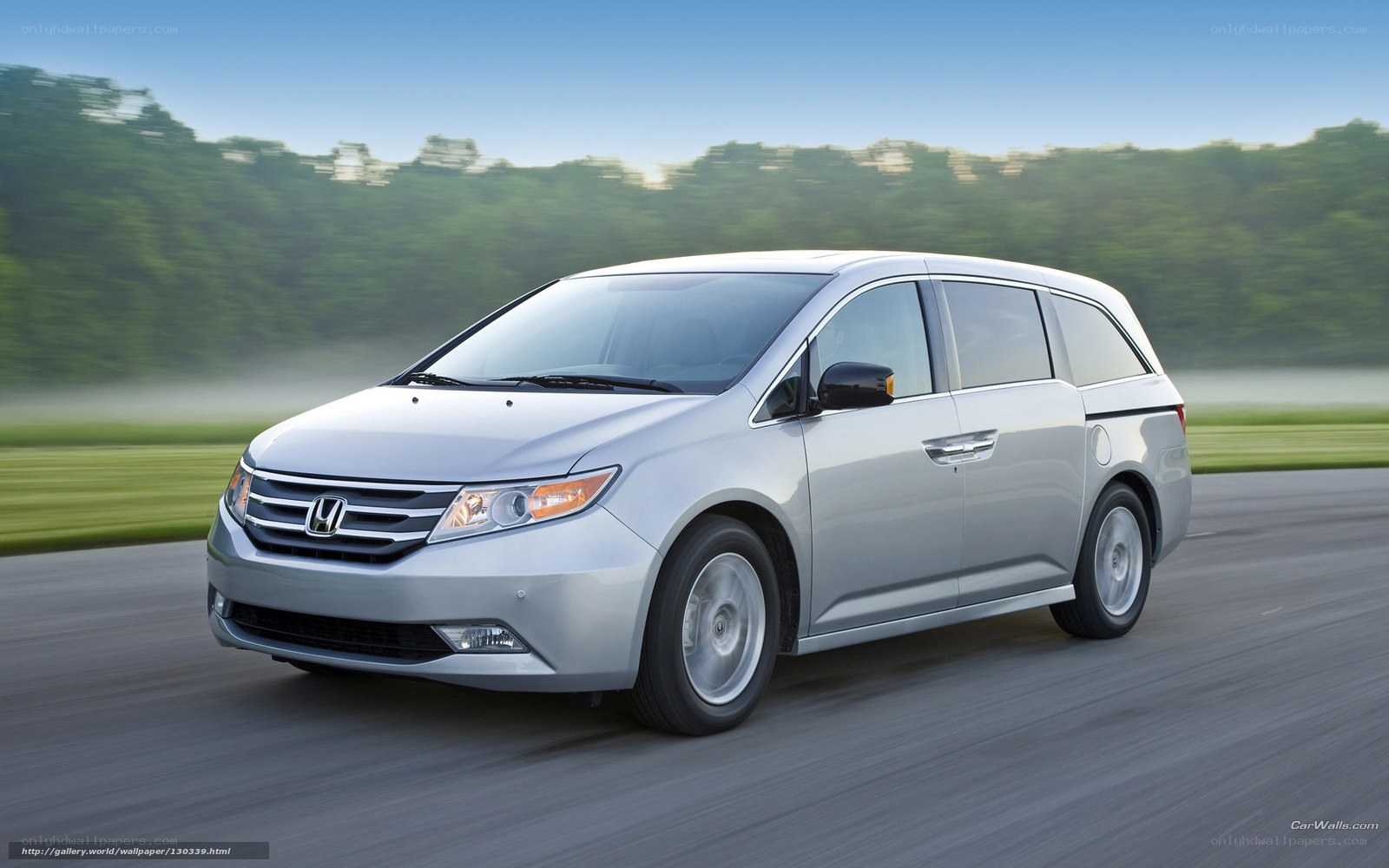 Silver Honda Odyssey in motion