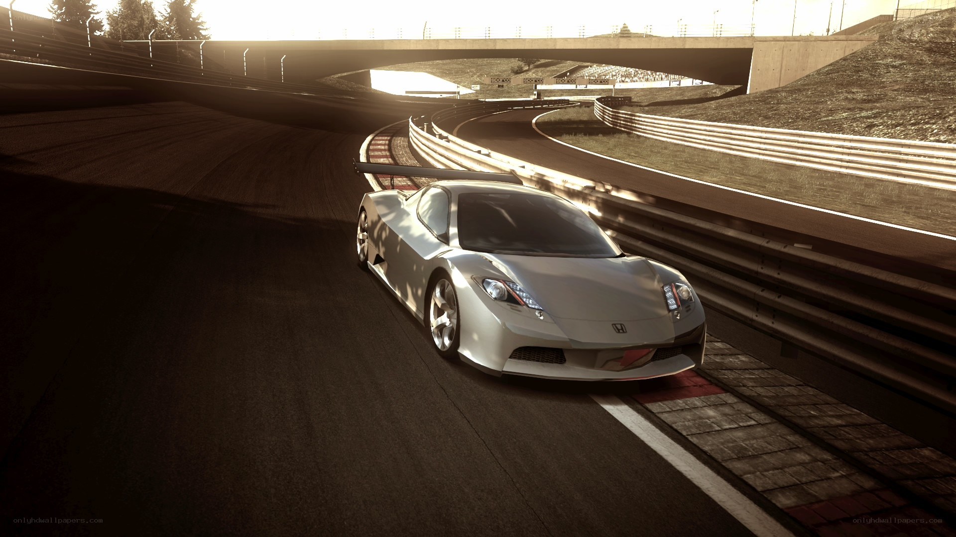 Silver Honda on a racetrack