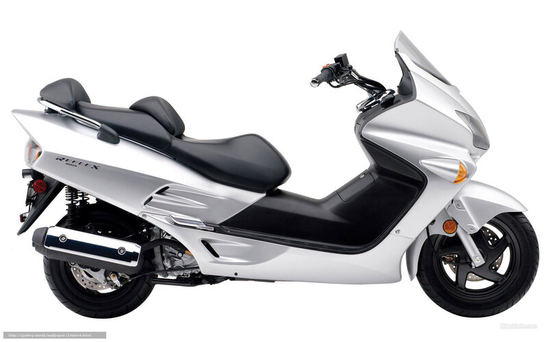 Silver Honda Reflex scooter