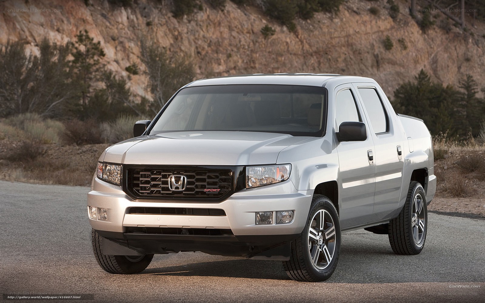 silver honda ridgeline pickup truck