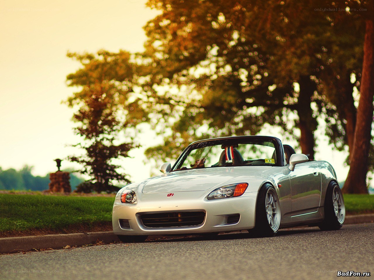 Silver Honda S2000 at sunset