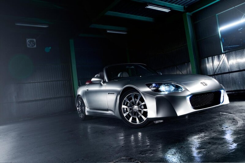 Silver Honda S2000 in garage