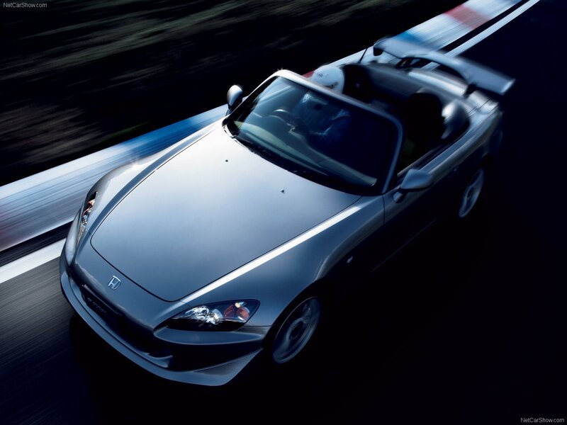 Silver Honda S2000 on a racetrack