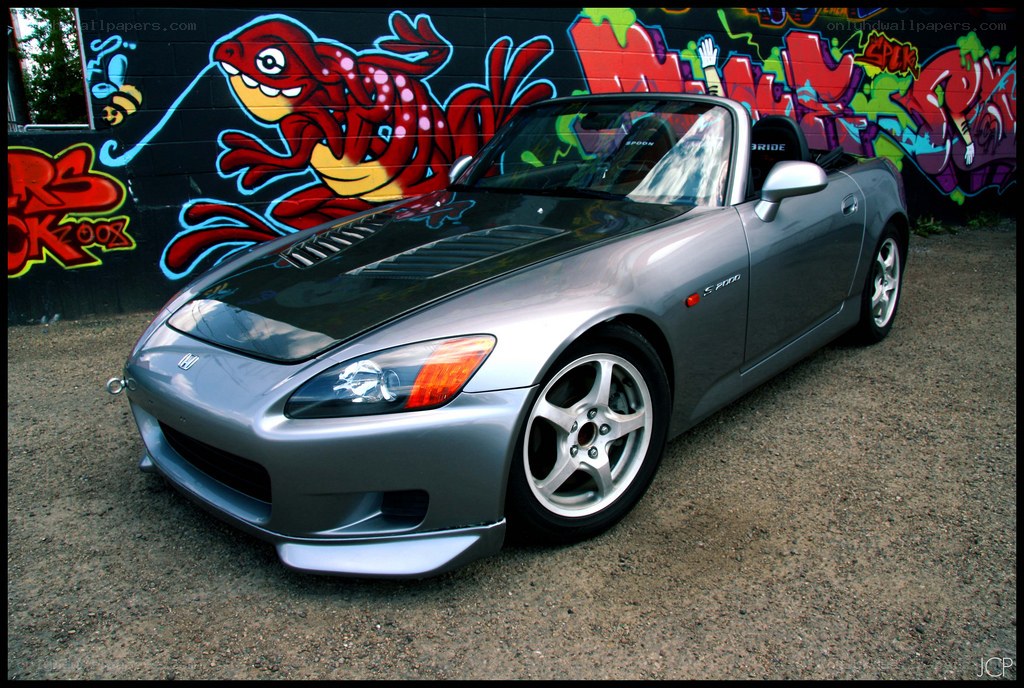 Silver Honda S2000 with graffiti