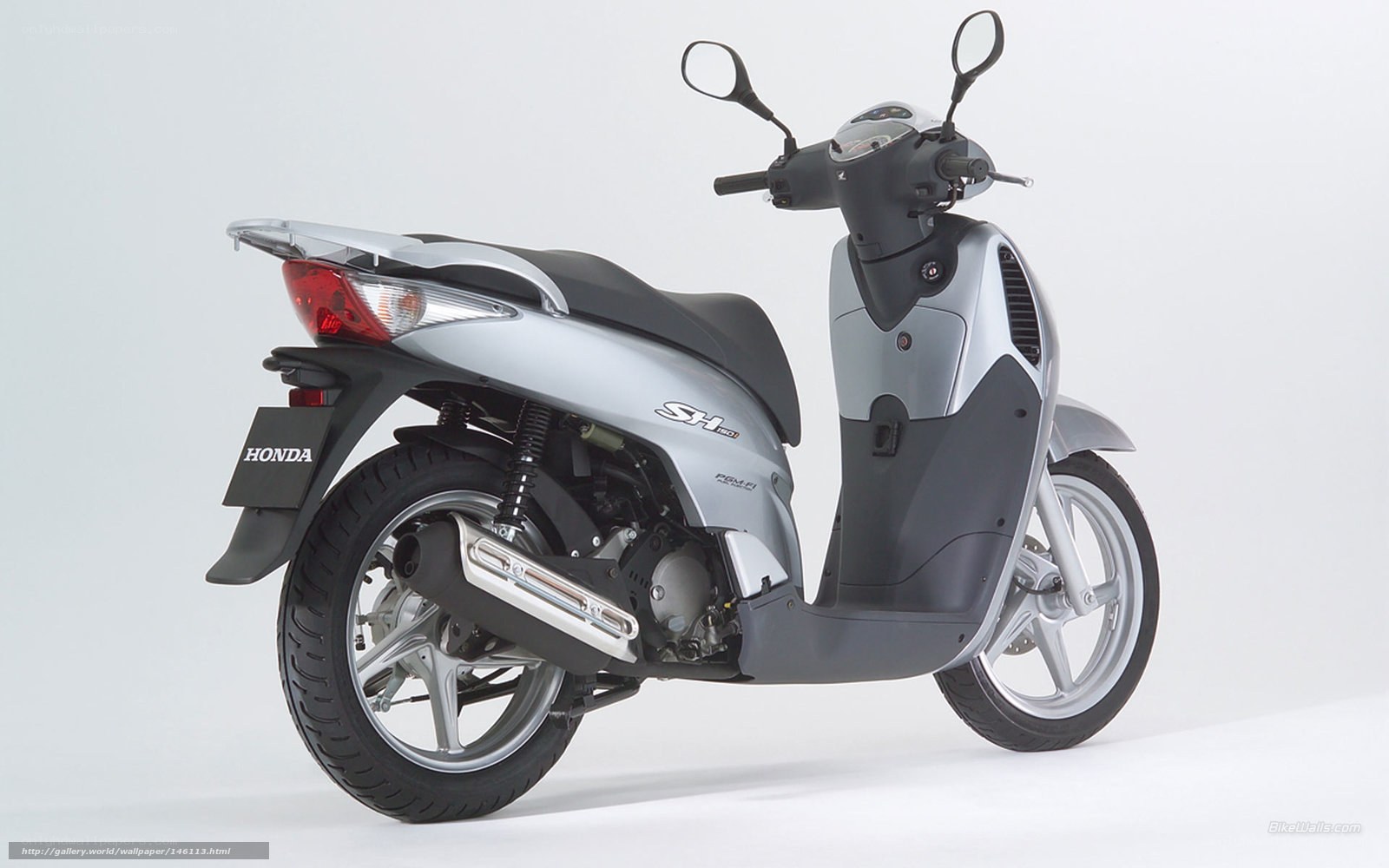 Silver Honda scooter