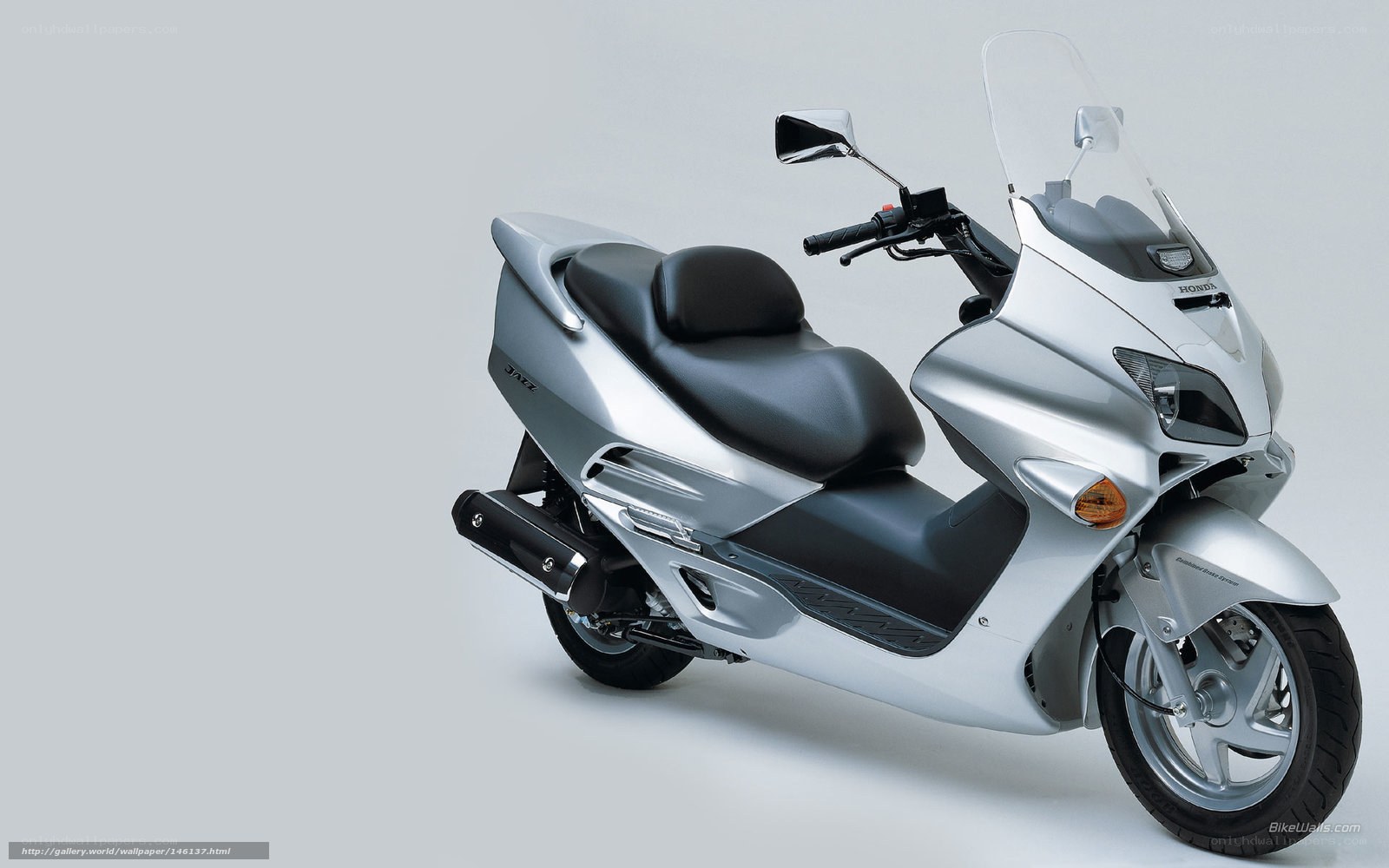 Silver Honda scooter