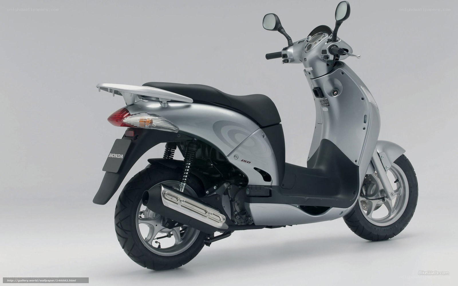 Silver Honda scooter