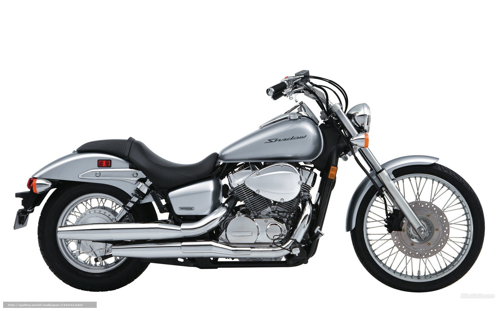 silver honda shadow motorcycle