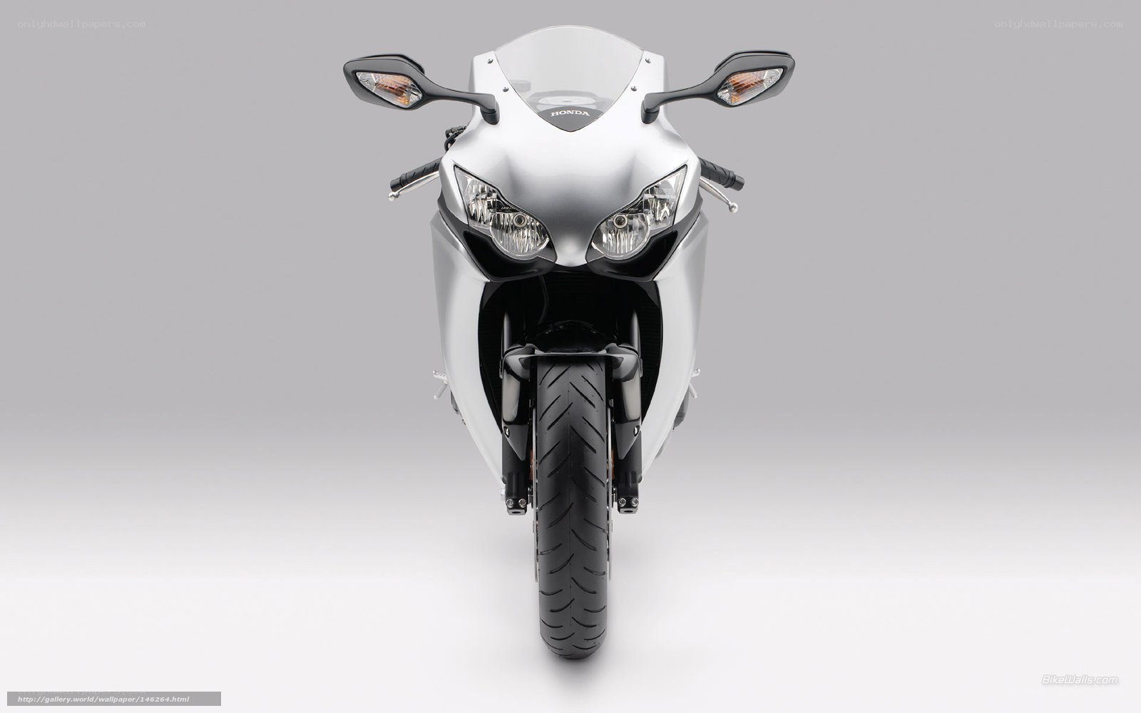 silver honda sport motorcycle