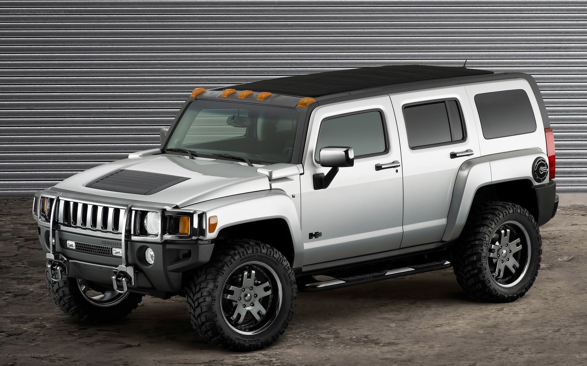 Silver Hummer H3 SUV
