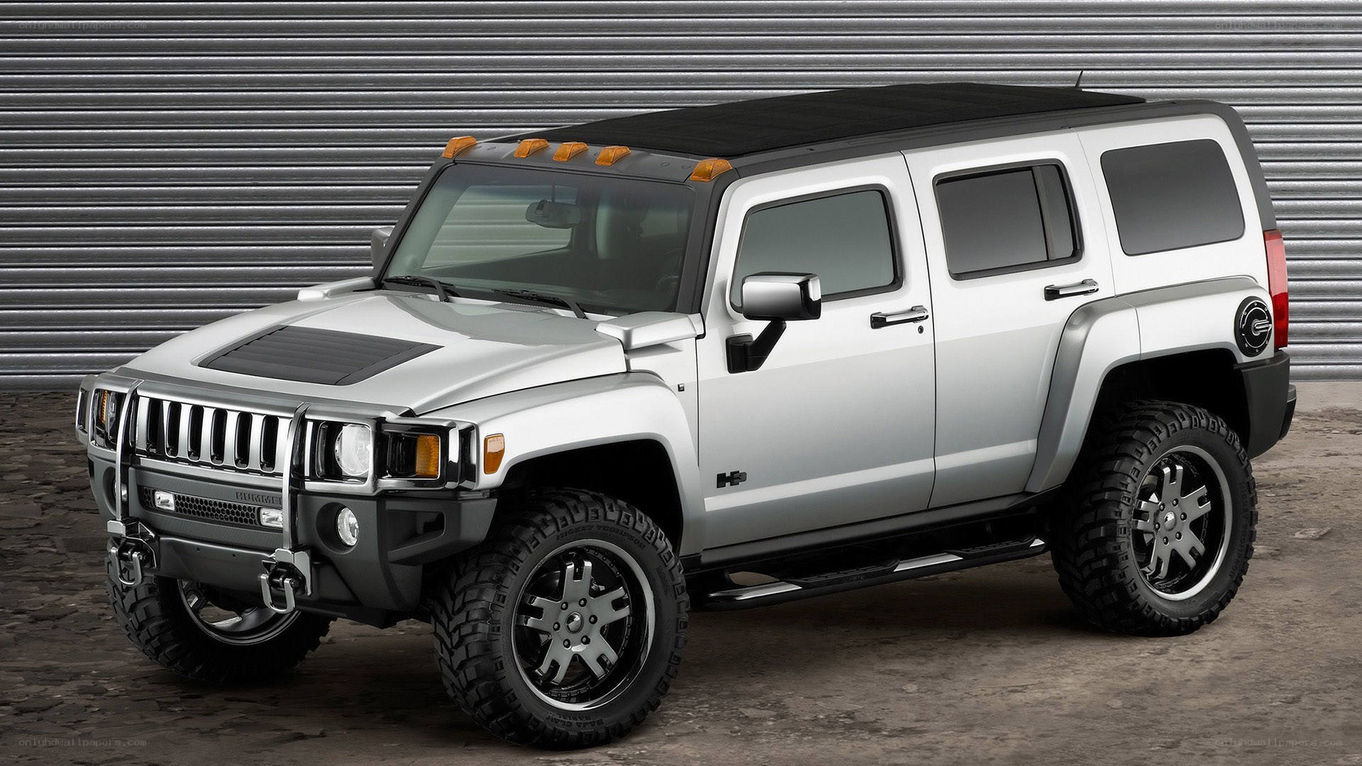 Silver Hummer H3 SUV