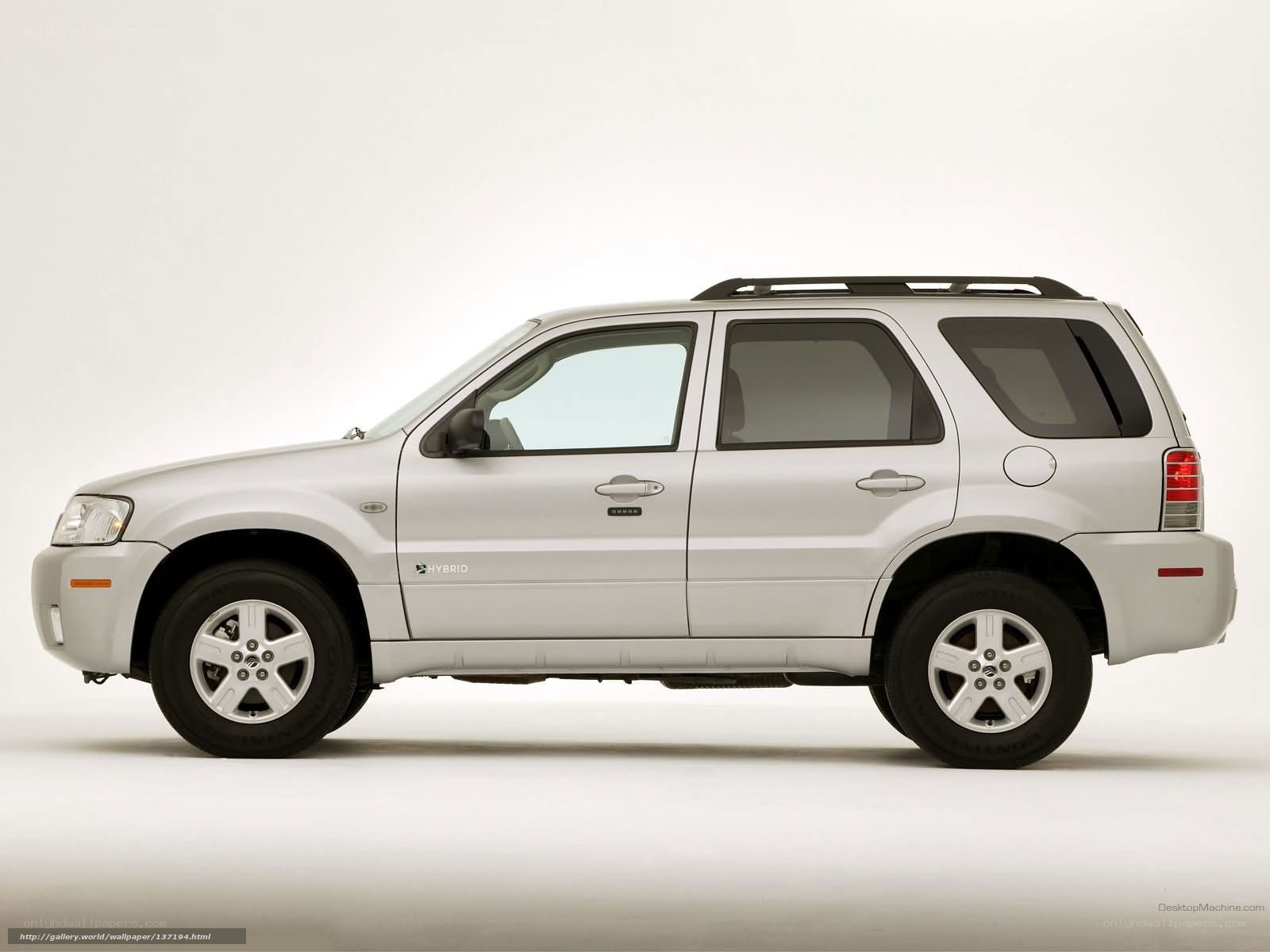 silver hybrid suv side view