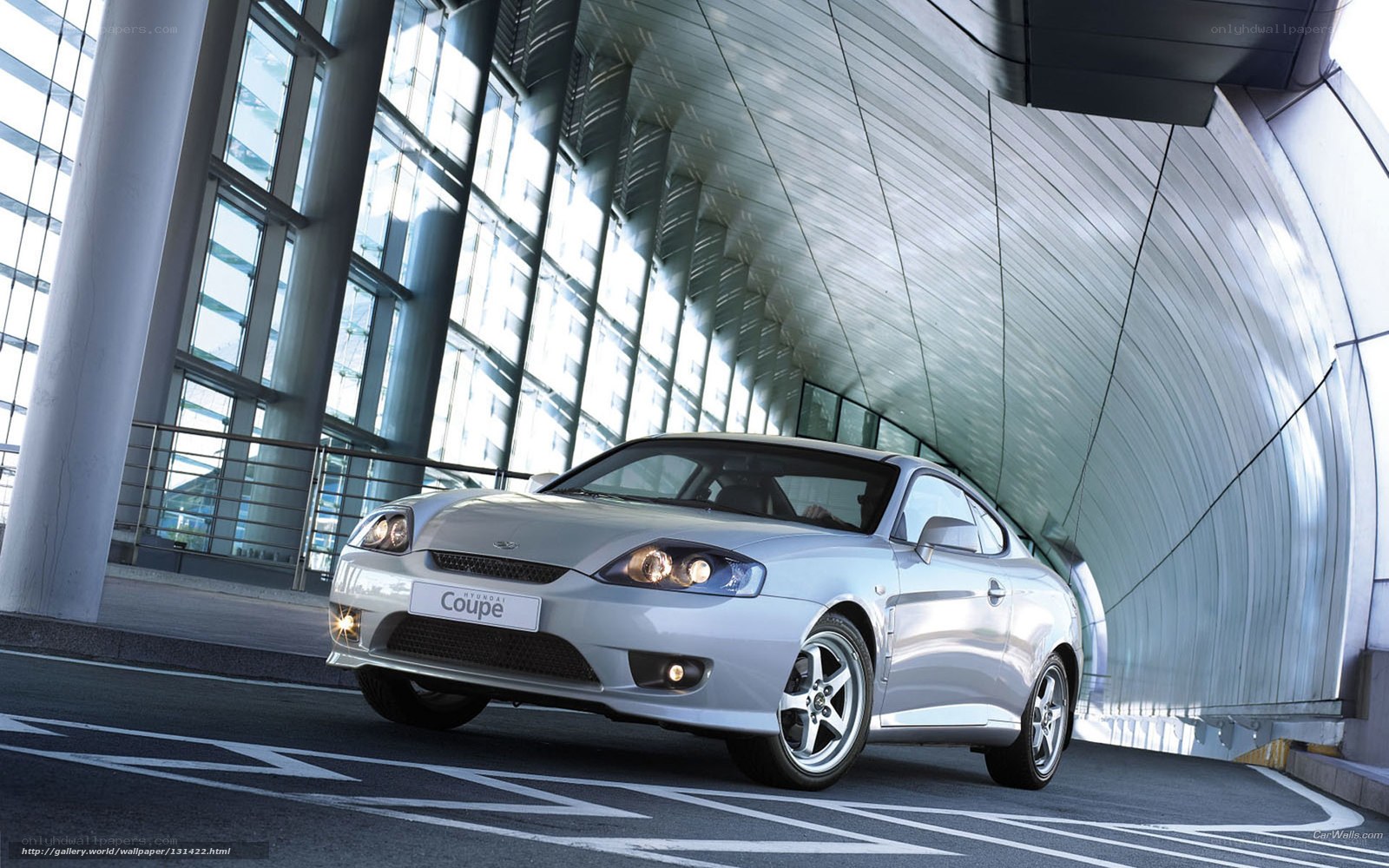 Silver Hyundai Coupe in modern building