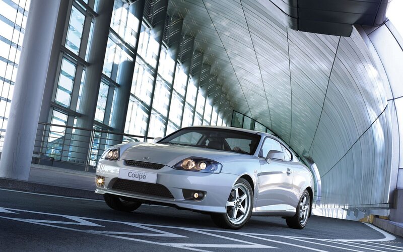Silver Hyundai Coupe in modern tunnel
