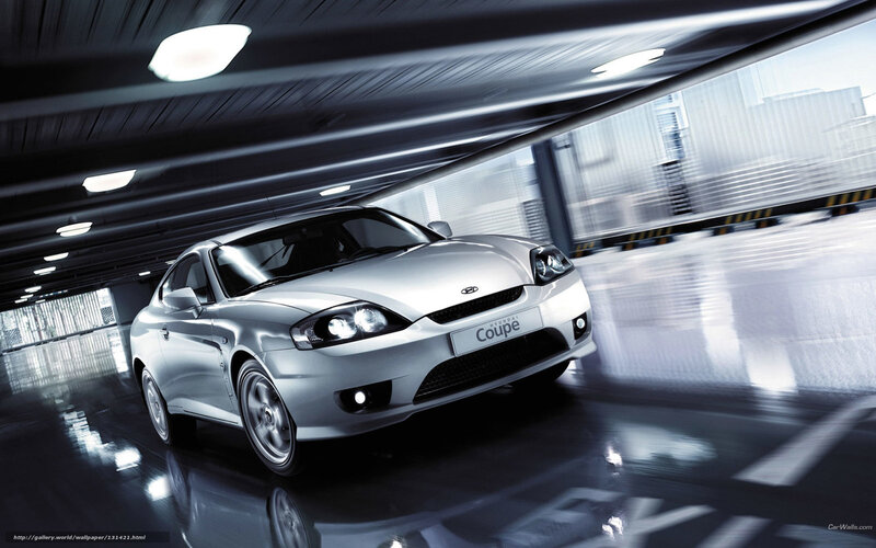 Silver Hyundai Coupe in motion