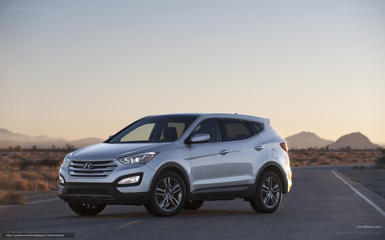 Silver Hyundai Santa Fe on desert road