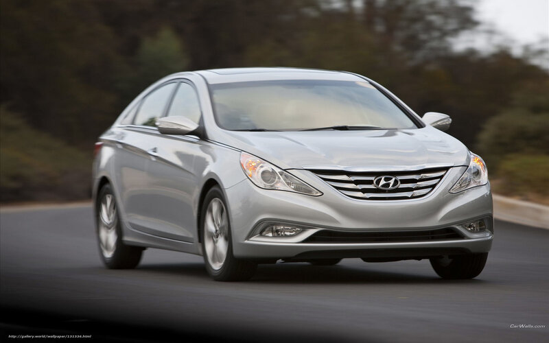 silver hyundai sonata in motion