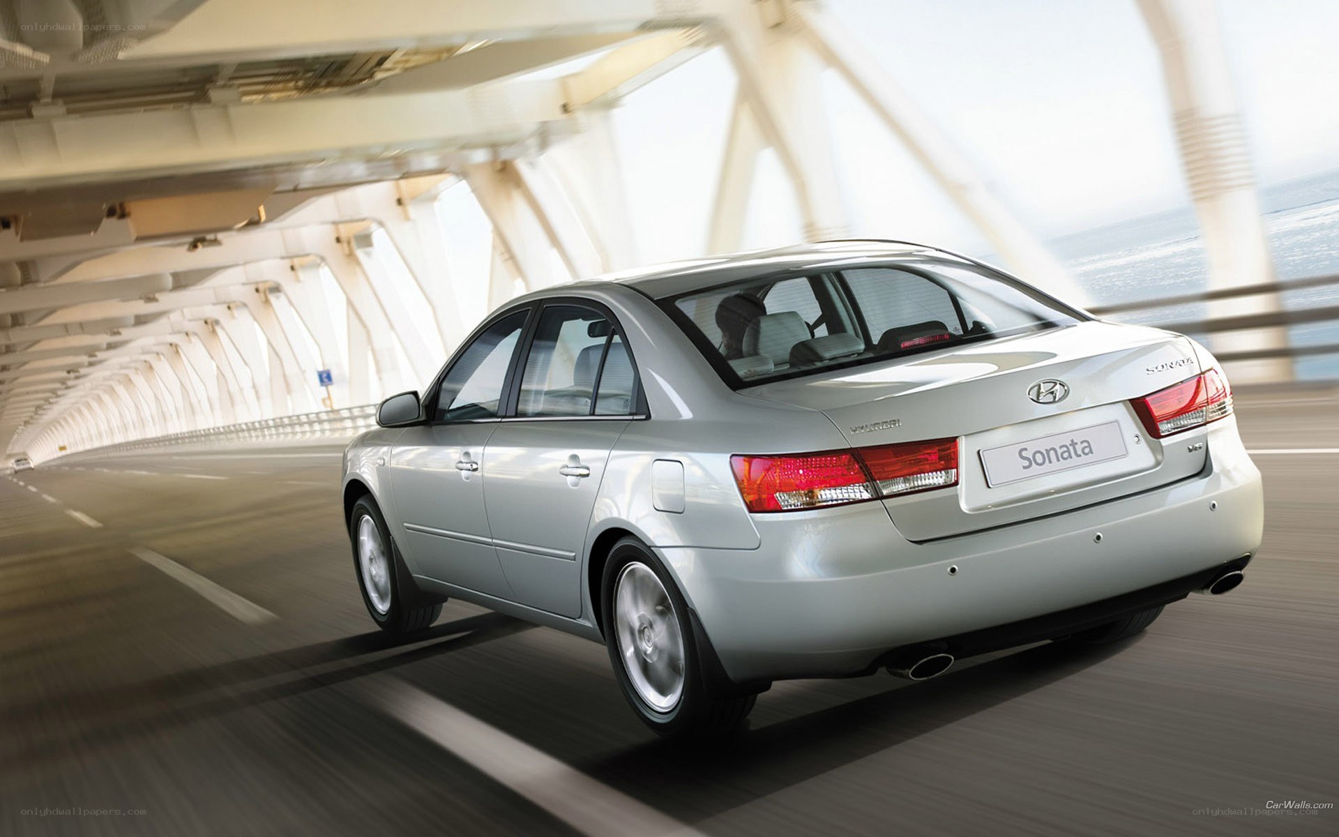 Silver Hyundai Sonata on a bridge