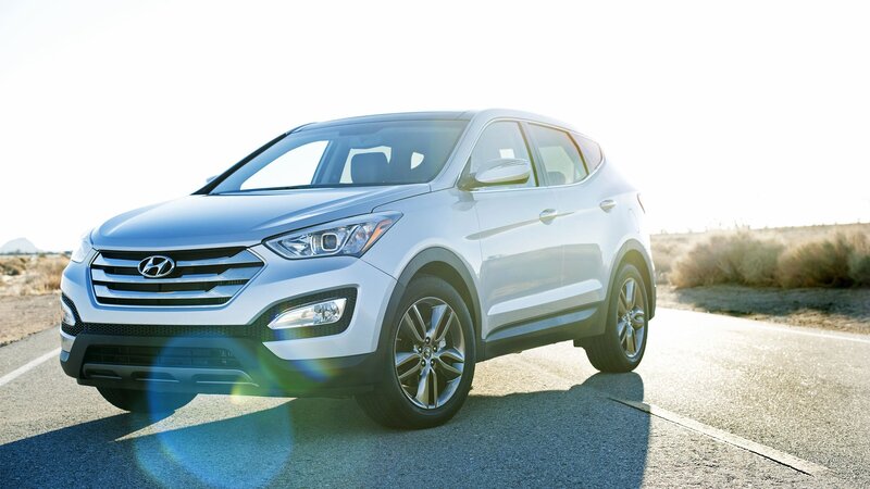 silver hyundai suv on road