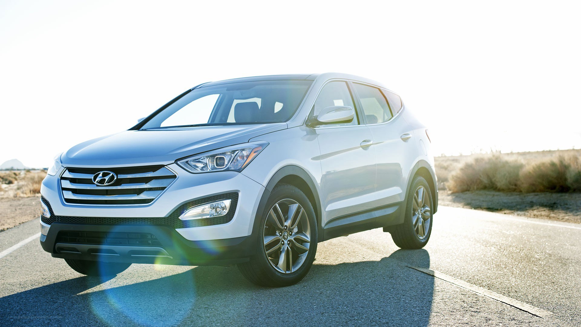 silver hyundai suv on road