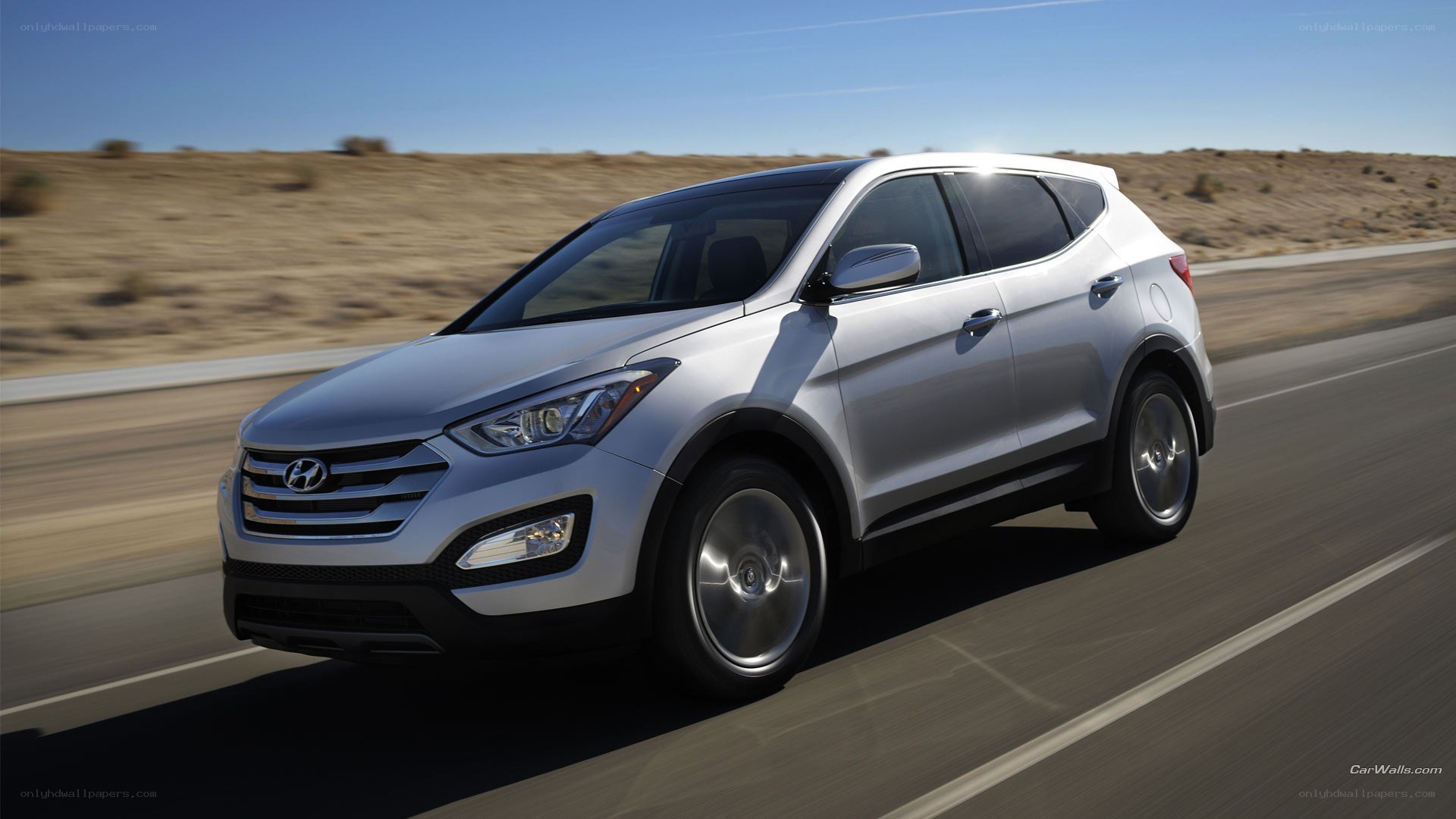 silver hyundai suv on road