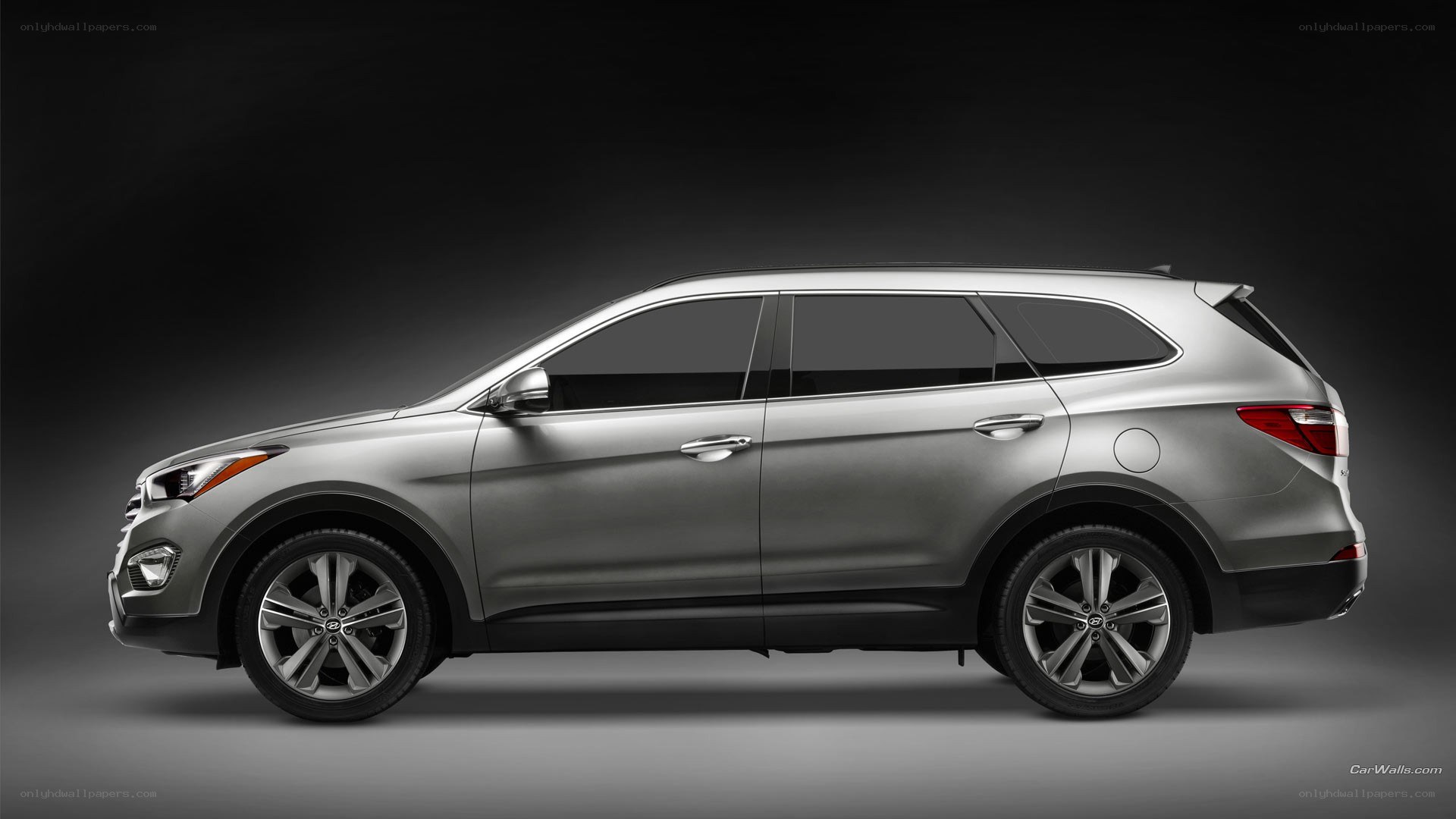 silver hyundai suv side view
