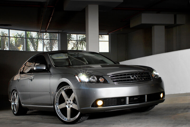 silver infini car in garage