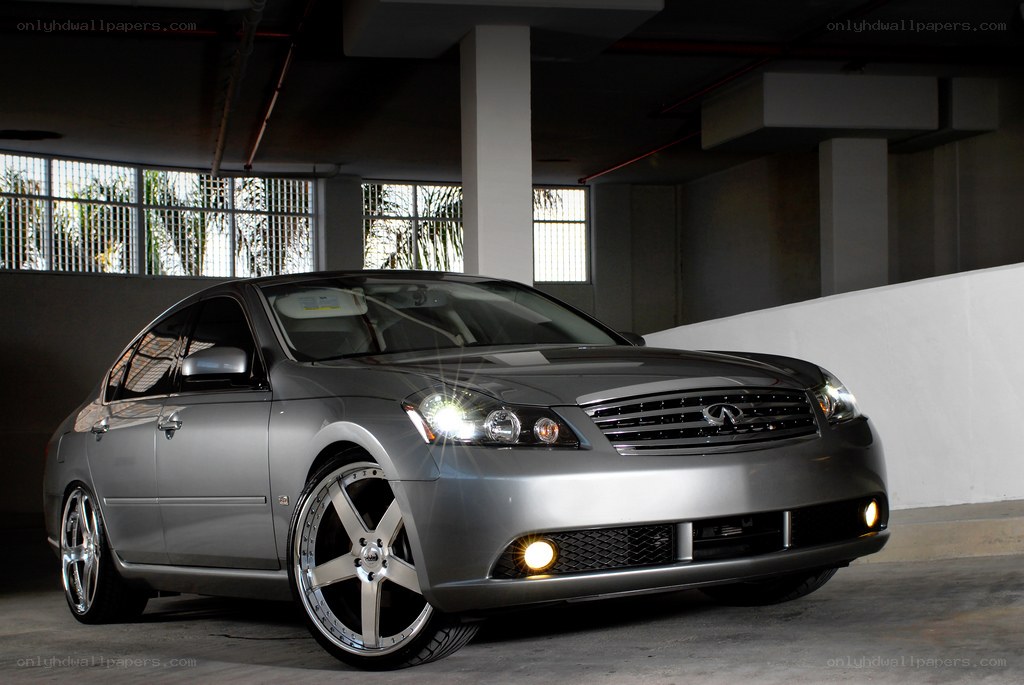 silver infini car in garage