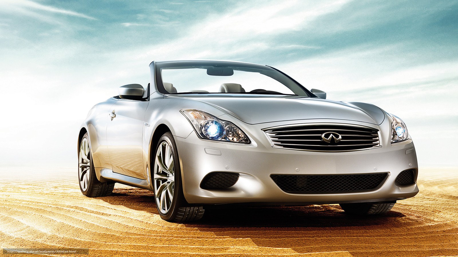 Silver Infiniti Convertible on Sand