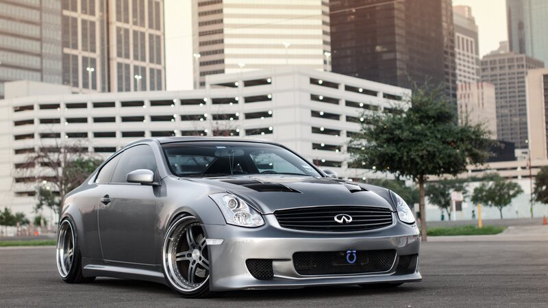 silver infiniti coupe in city